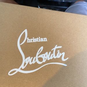 christan louboutin multi color red bottoms